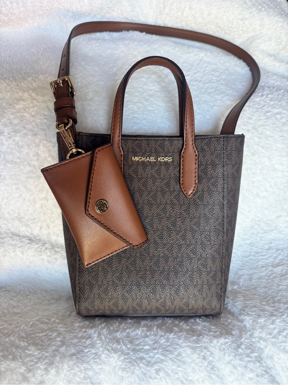 Michael Kors Brown Monogram Mini Tote with Tan Leather Accents. Great Condition.